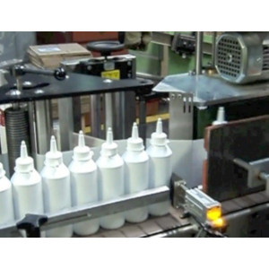 Machine étiqueteuse automatique pour flacons - Pose sur bouteille et produits cylindriques