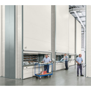 Stockeur vertical Lift - Magasin vertical automatisé pour un stockage compact et sécurisé. Les emplacements des articles sur les plateaux conteneurs mobiles sont déterminés en fonction des dimensions des produits. 
