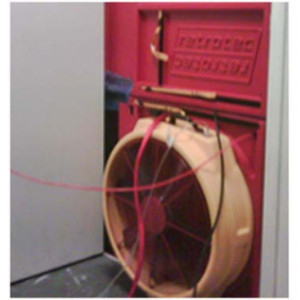 Service étancheité de salle informatique - Ventilateur posé au niveau de la porte d’accès