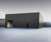 Bâtiment acrotère isolé 380m² a porte sectionnelle et portillon