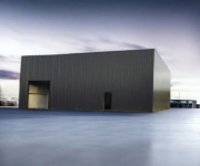 Bâtiment acrotère isolé 380m² + porte sectionnelle &amp; portillon