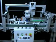 Étiqueteuse automatique bouteilles par banderolage