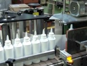 Machine étiqueteuse automatique pour flacons